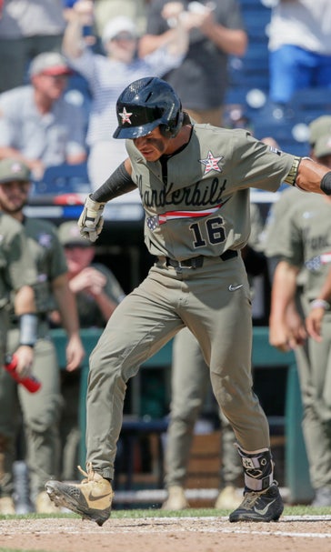 Martin hits 2 HRs, Vanderbilt beat Louisville 3-1 in CWS